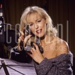 Marga Bult at sound studio 

[keywords]Posed, Half Length, Eyecontact, Singer, Headphone[/keywords]